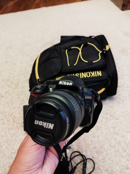 Nikon D3100 + lente extra