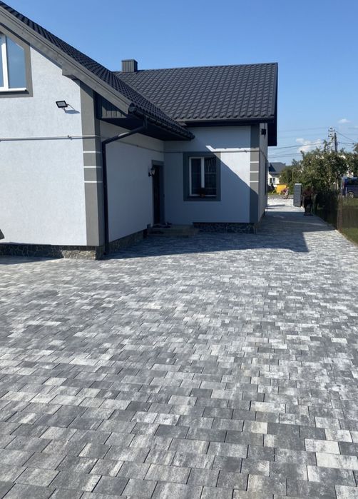 Укладання бруківки, вкладання бруківки, тротуарної плитки.