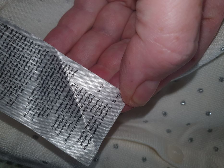 Sweterek biały w srebrne kropki Orsay L