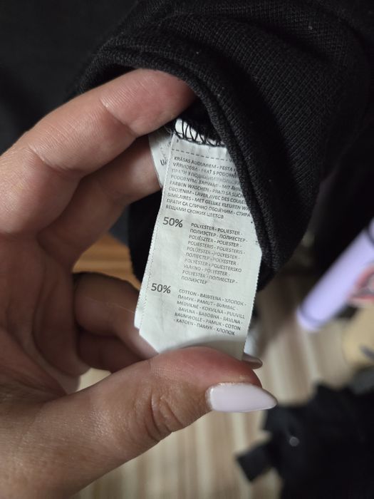Czarna bluza damska z asymetrycznym zamkiem M CROPP