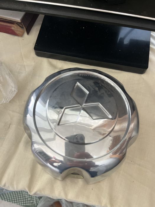 Tampa cubo de roda L200 ou Pajero