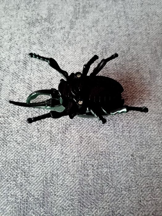 Chrząszcz nakręcany zabawka Herkules Żuk