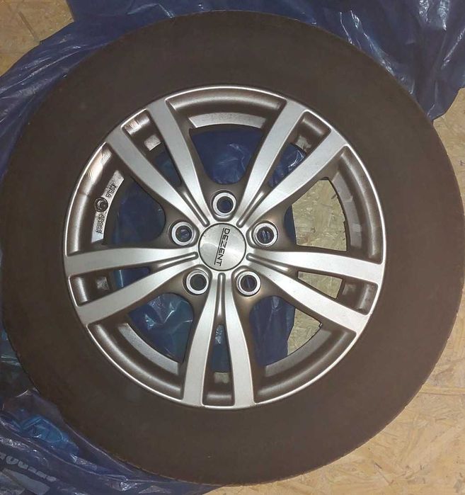 Felgi aluminiowe Dezent z oponami letnimi Hankook 195/65/R15