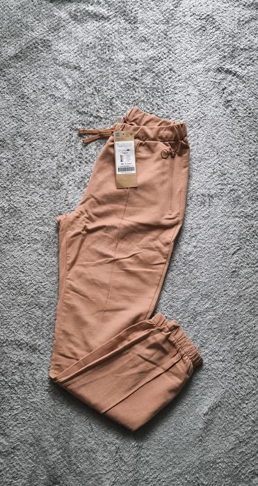 Nowe spodnie dresowe coccodrillo r. 158