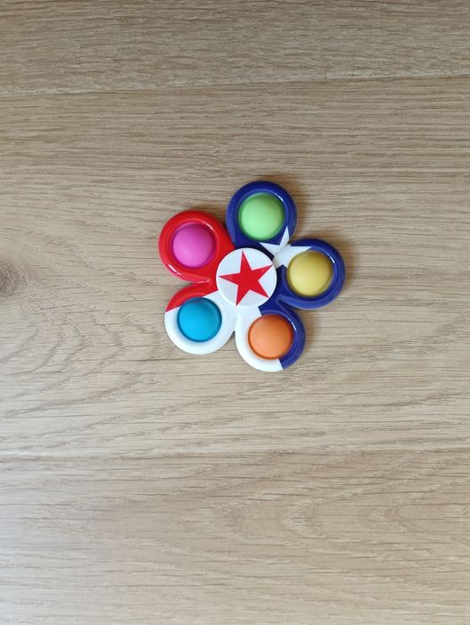 Fidget spiner połączony z pop it
