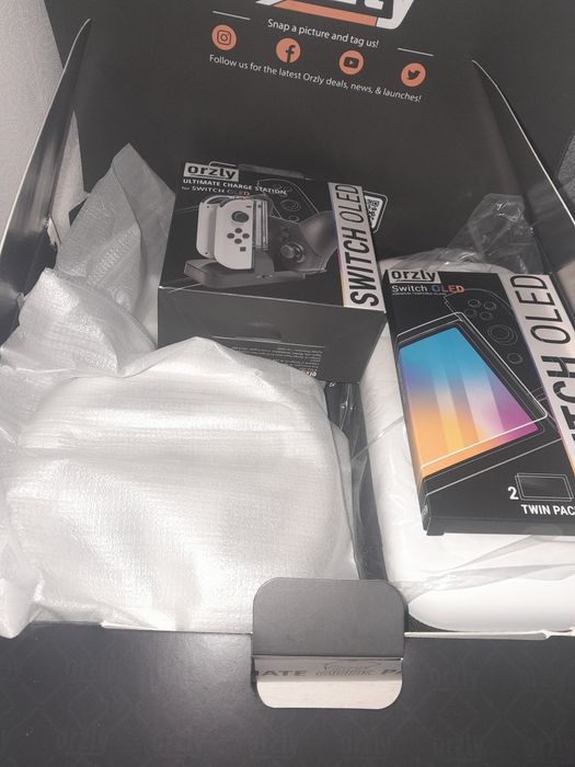 Orzly ultimate geek pack do nintendo switch oled pakiet akcesoriów