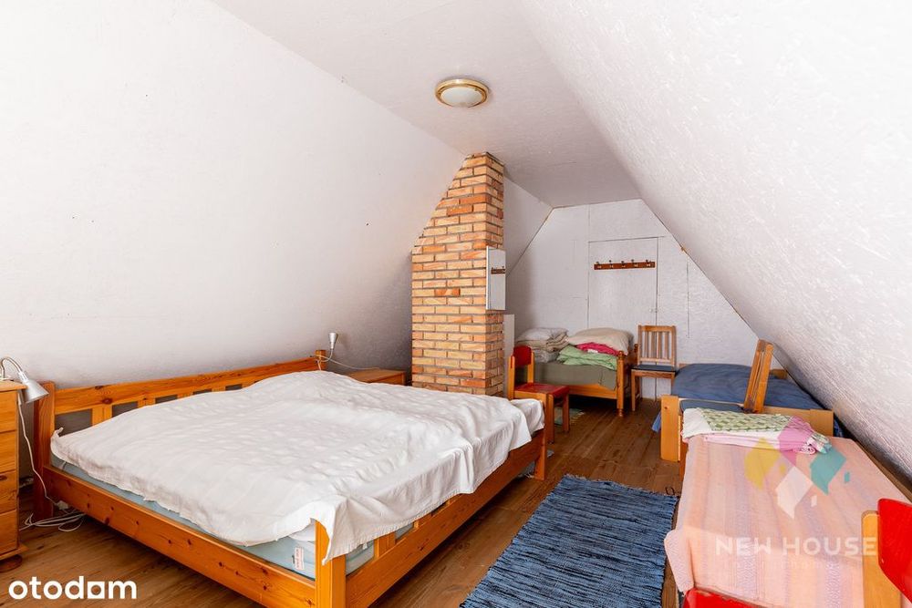 Dom wolnostojący w stylu warmińskim, las, jezioro