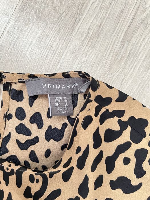 Жіноча леопардова сукня