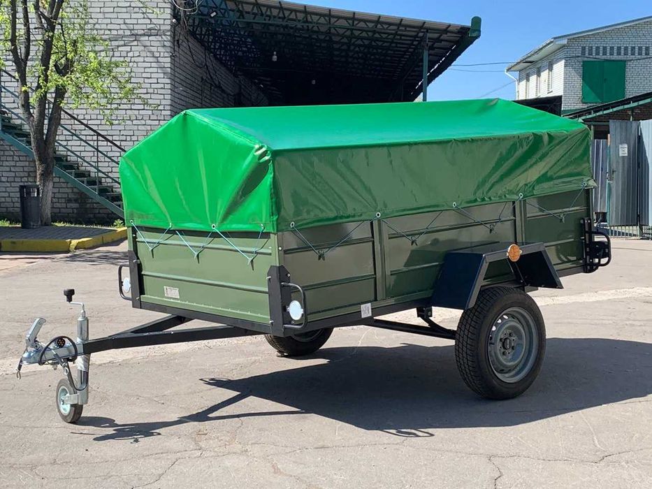 Автомобільний причіп з колесами та тентом з документами новий причіп