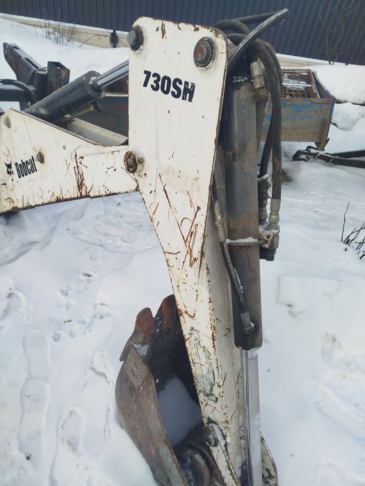 Прицепний екскаватор для бобката