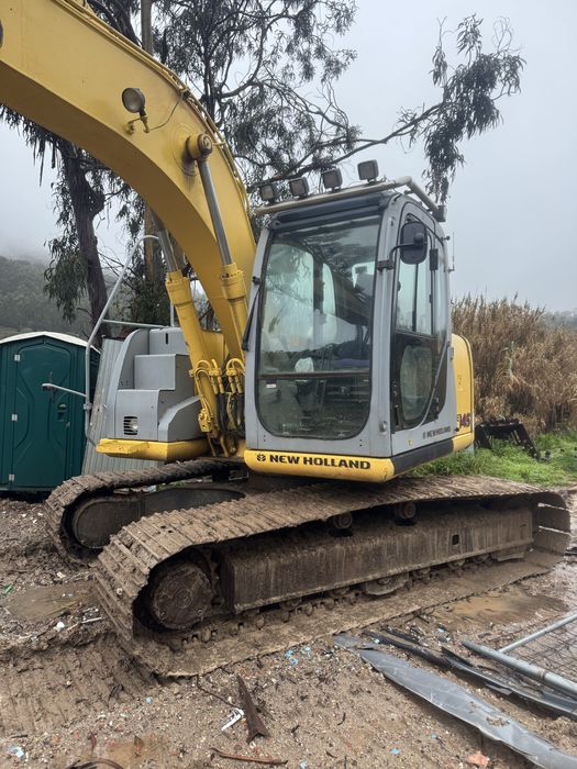 Giratoria new holland e145 em bom estado