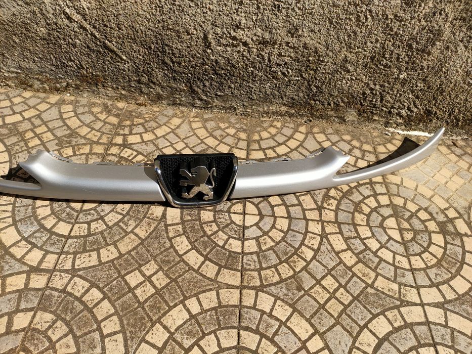 Grelha frontal  Peugeot 206 com simbolo