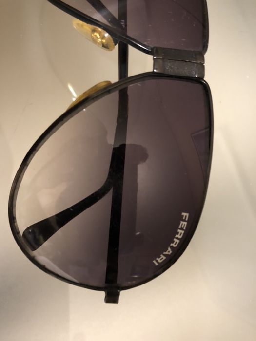 Óculos Ferrari dobraveis com pentes pretas