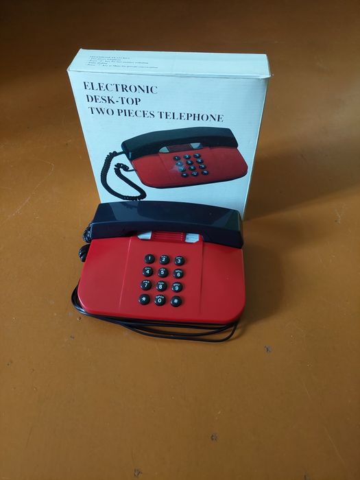 Телефон кнопочный