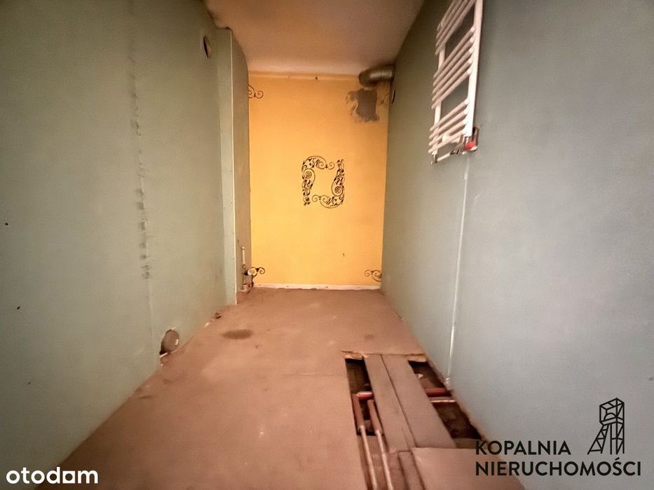 Deptak przy rynku piękna kamienica miejskie