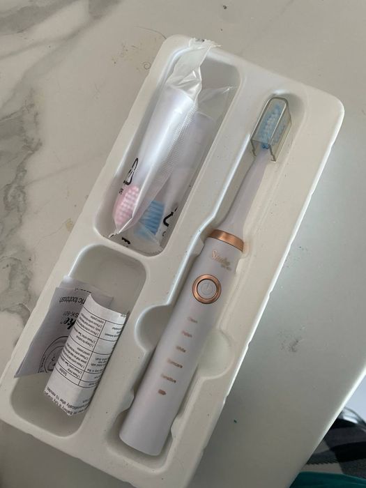 Електрична зубна щітка