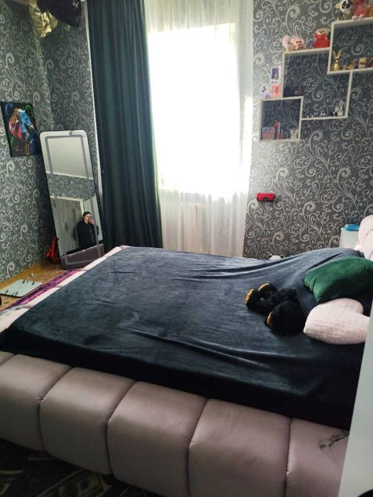 Ліжко с подиумом