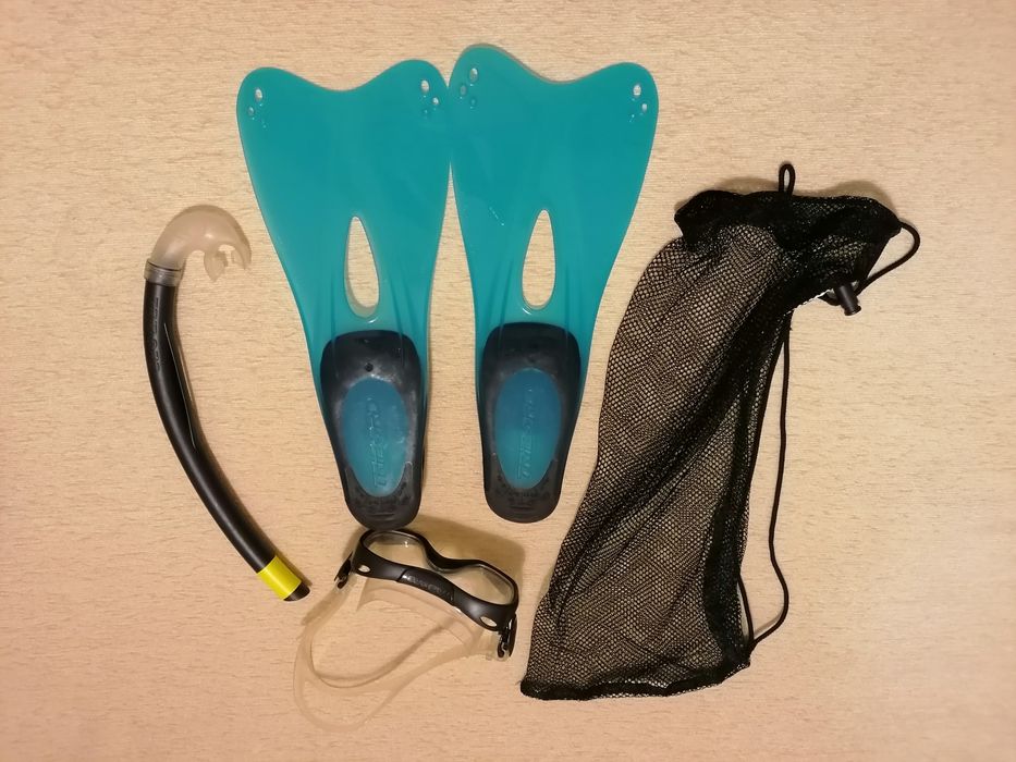 Fins, snorkel, and diving goggles
