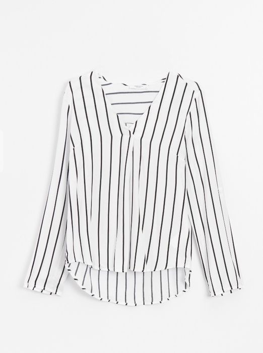 Біла жіноча сорочка