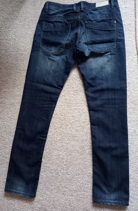 Sprzedam  nowe spodnie jeansowe SCOTFREE 32x32