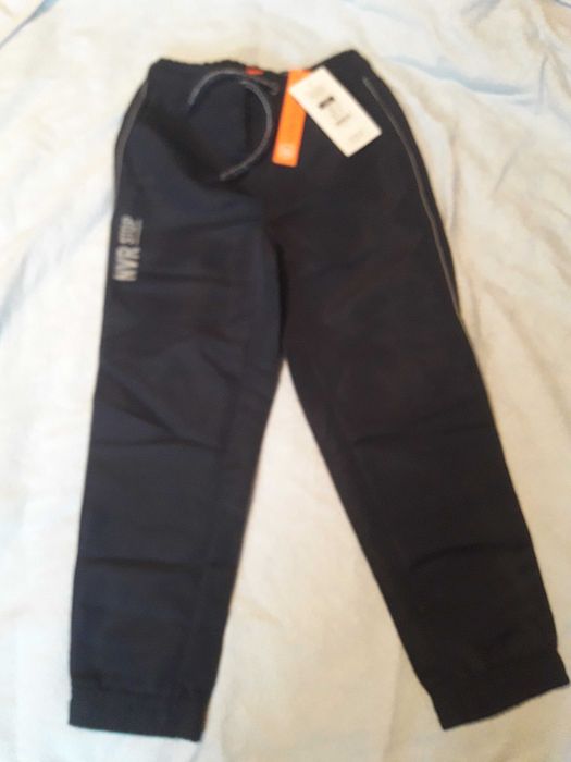 Nowe spodnie sport tech cienkie 122 cool club