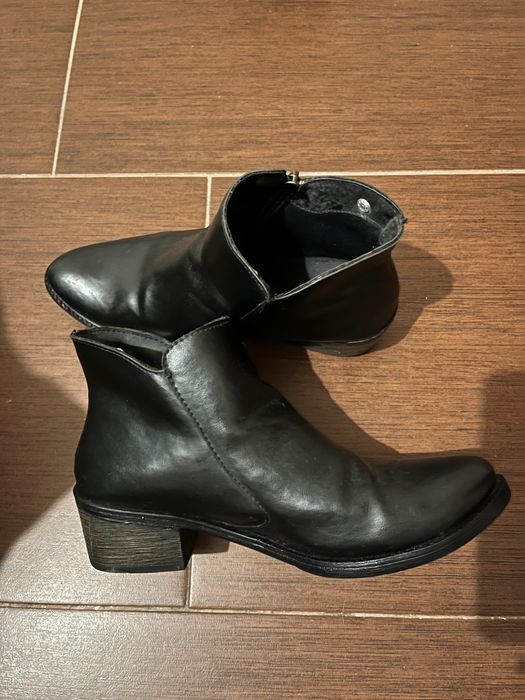 Botas senhora em pele quentinhas em ótimas condições usados