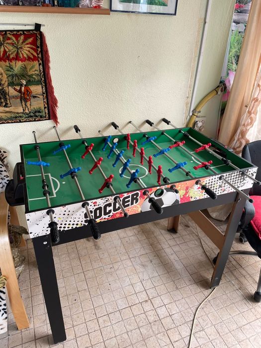Mesa de matraquilhos e diversos jogos