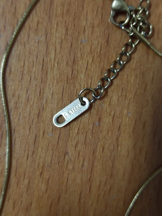 Colar em aço olho turco  com pérolas NOVO