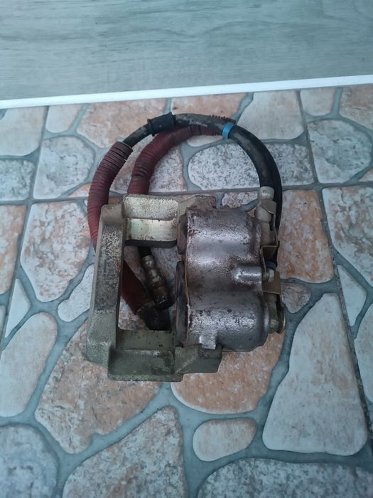 Суппорт ВАЗ Нива 2121 21214 левый новый