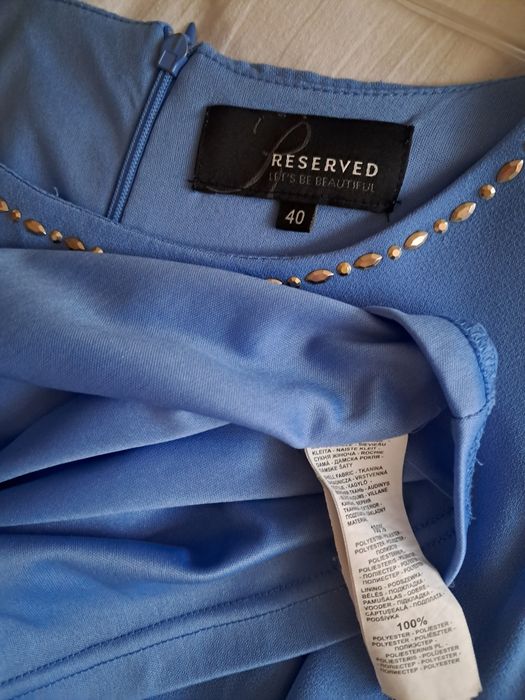 Suknia midi asymetryczna błękitna bez rękawów r.38-40"Reserved".