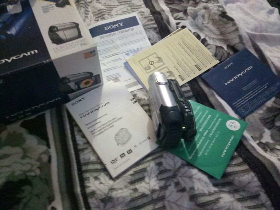 Видеокамера,бинокль,фотоаппарат три в одном