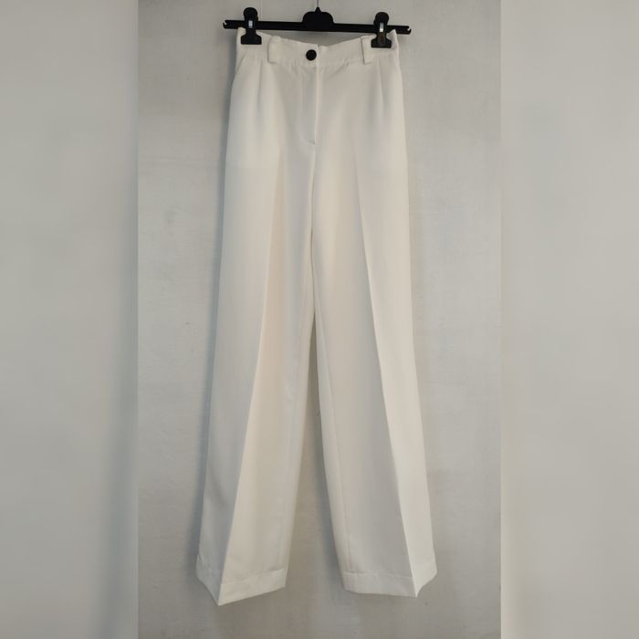 Продаю білі брюки XS