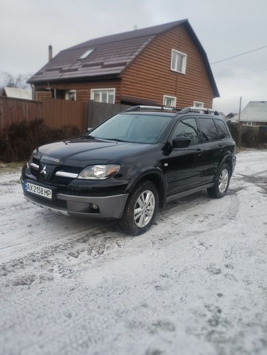 Аутлендер 2.4 бензин