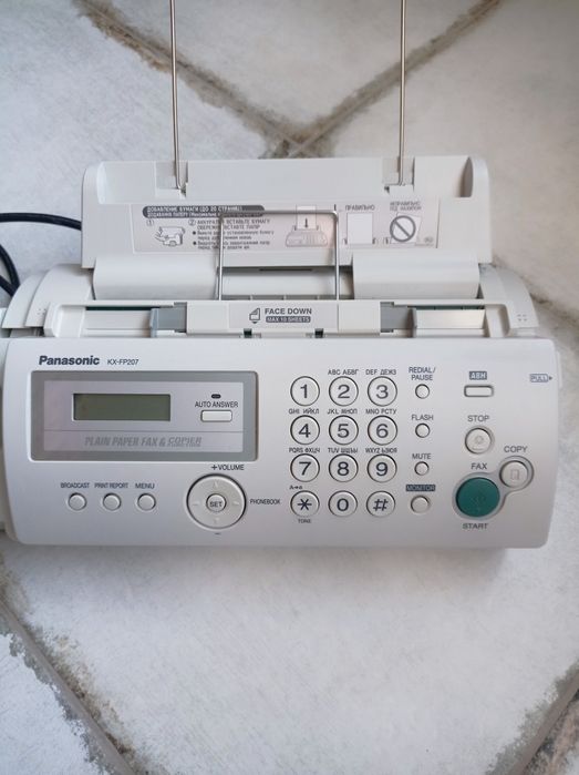 Компактный телефон-факс Panasonic KX-FP207UA на звичайному папері