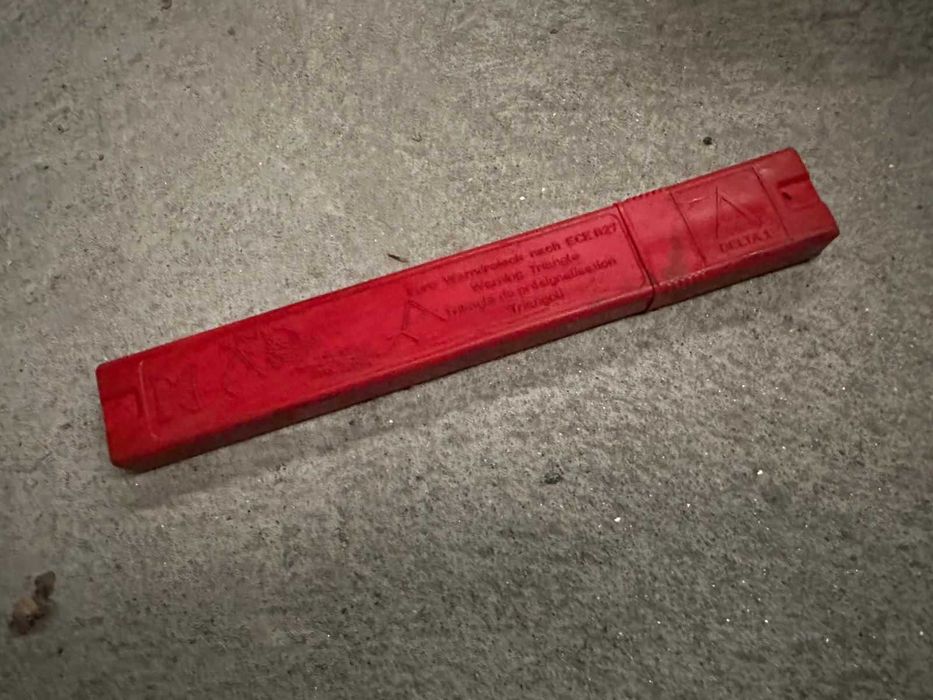 Triângulo com caixa como Novo