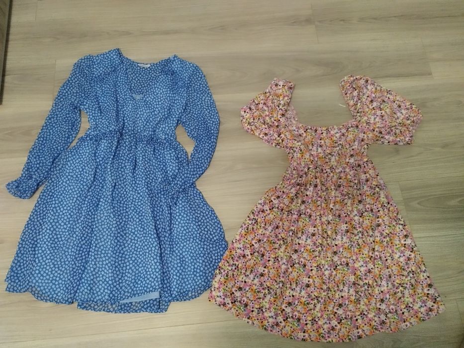 Величезний пакет  одягу на жінку.