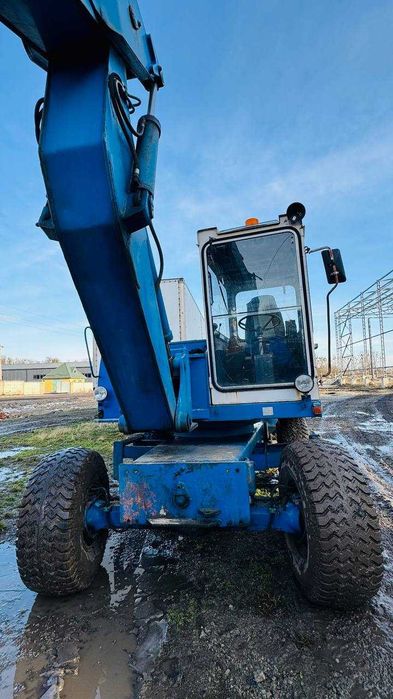 екскаватор, трактор Fuchs