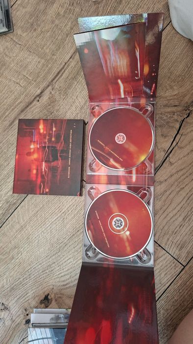 Płyty CD Riverside z autografami