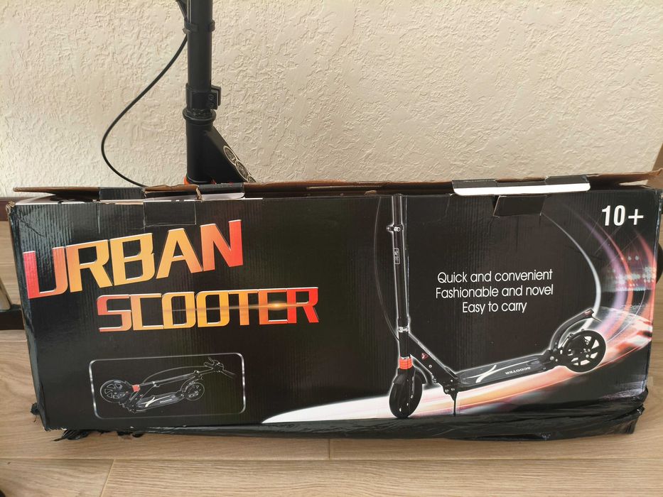 Двоколісний самокат Urban Scooter  з амортизаторами і дисковим гальмом