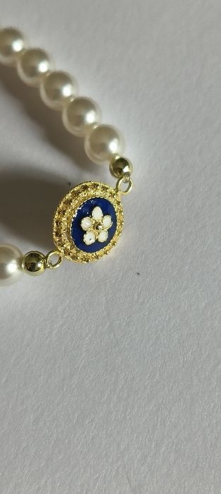 Pulseira pérolas com caramujo em prata