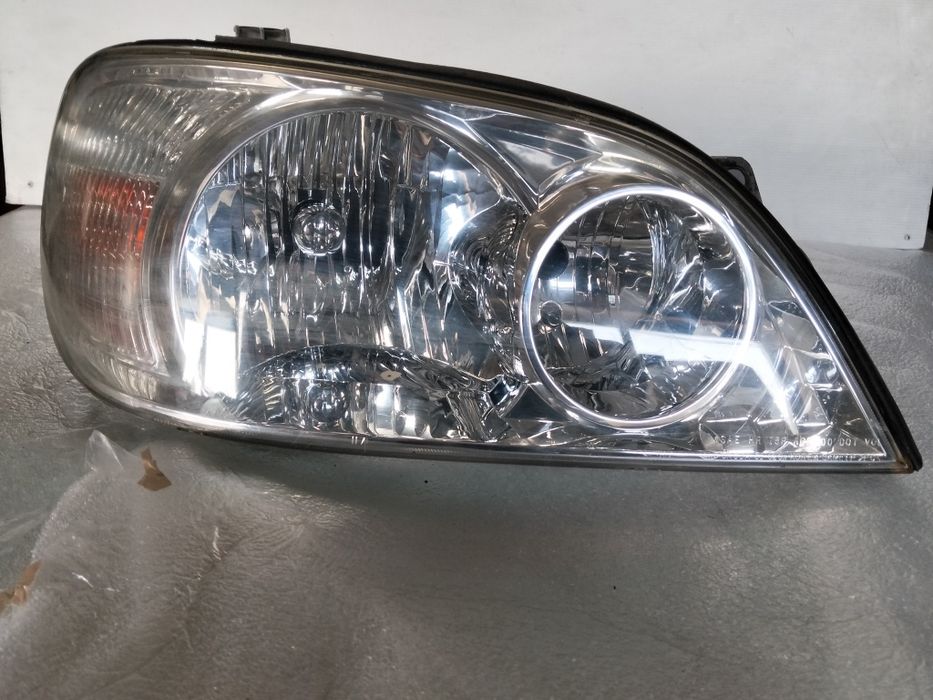 Farol Kia carnival 2 ótica original 2003  facelift