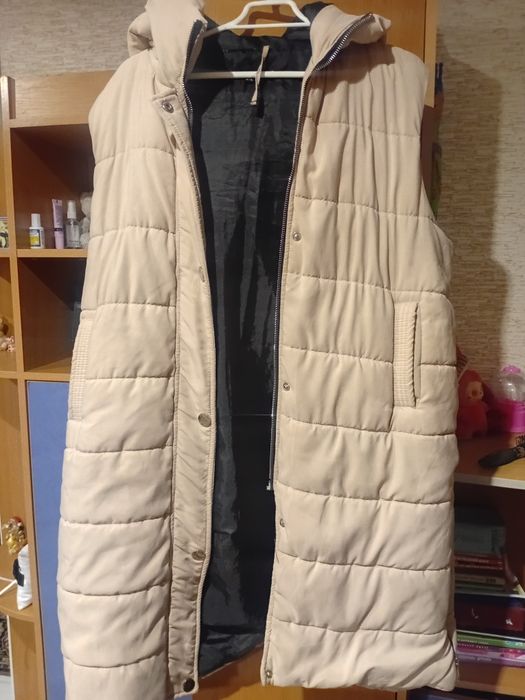 Жіноча желетка пуховик.