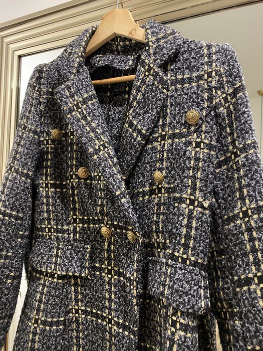 Blazer as riscas com botoes dourados