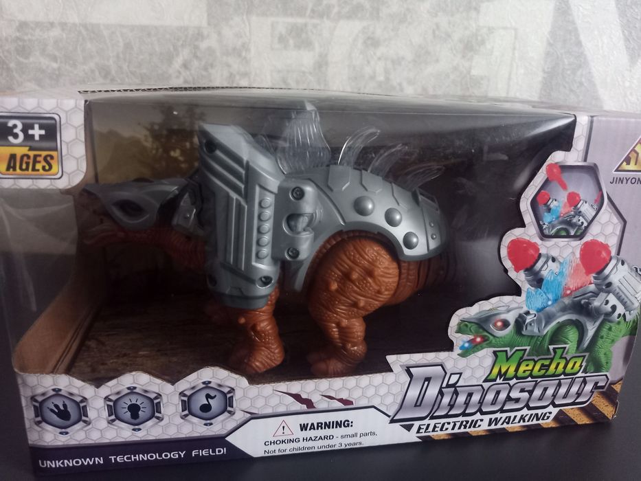 Динозавр іграшковий