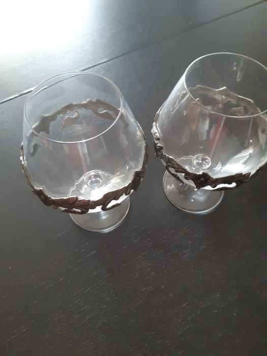 Copos de vidro e estenho