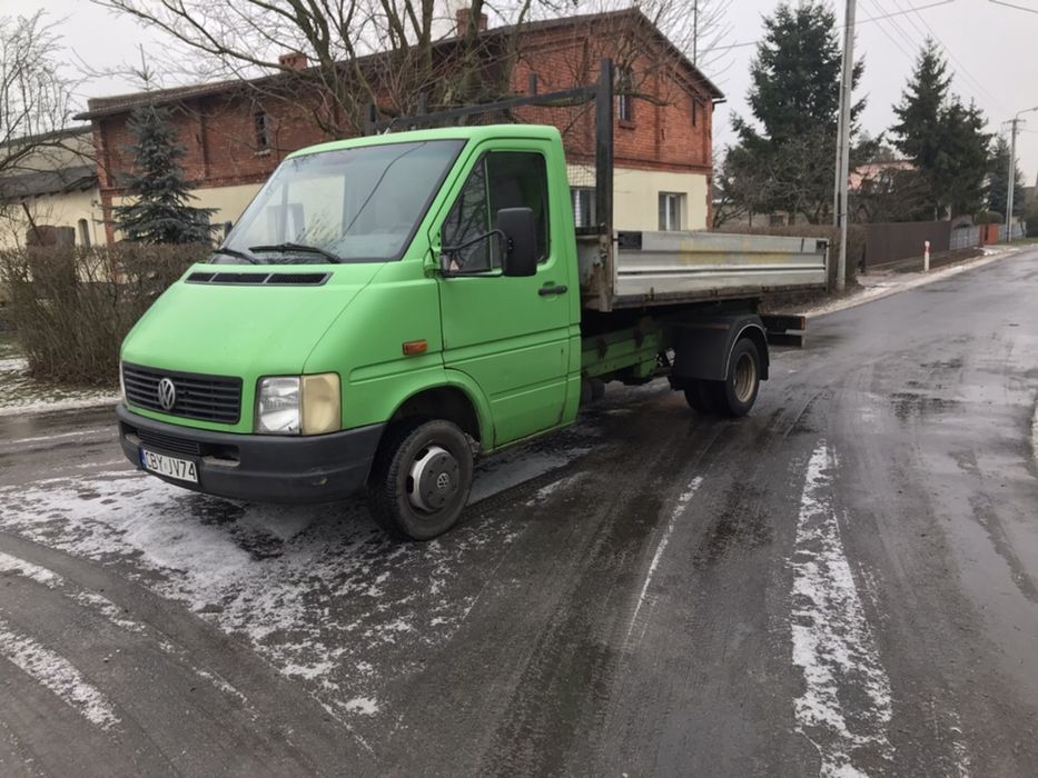 Usługi z miniładowarka Bobcat 543 transport LT46 z wywrotka