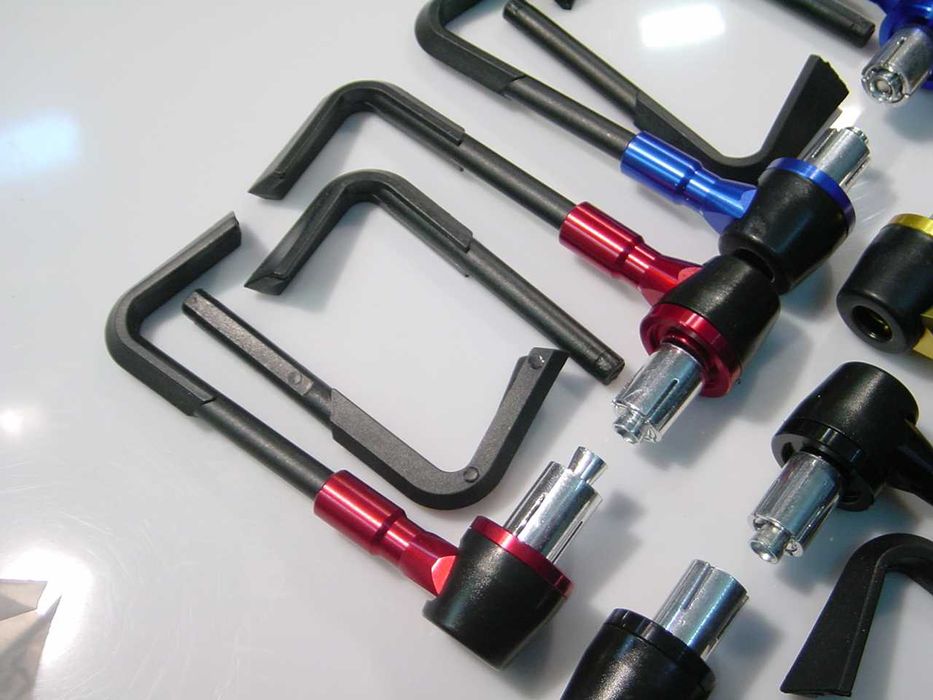 Topos protetores de manetes para guiador ou avanços