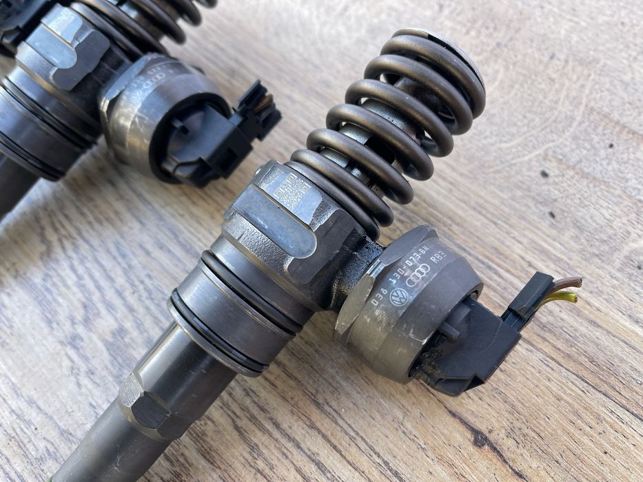 Насос форсунка 1.9 tdi bls VW Passat B6 VW Golf 5 VW Caddy 038130073BN