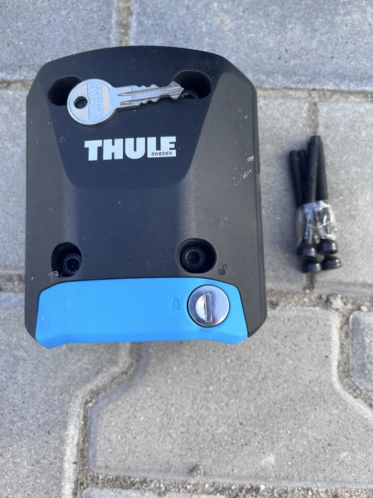 Fotelik rowerowy Thule Ridealong + Kask