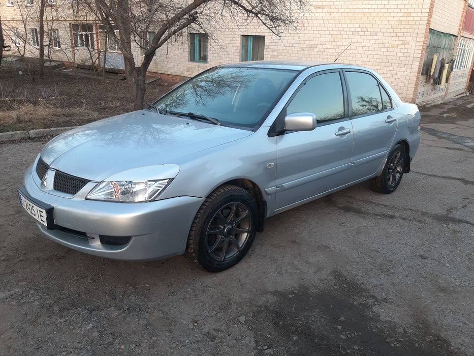 Мітцубісі Ланцер  9 з газом 4.